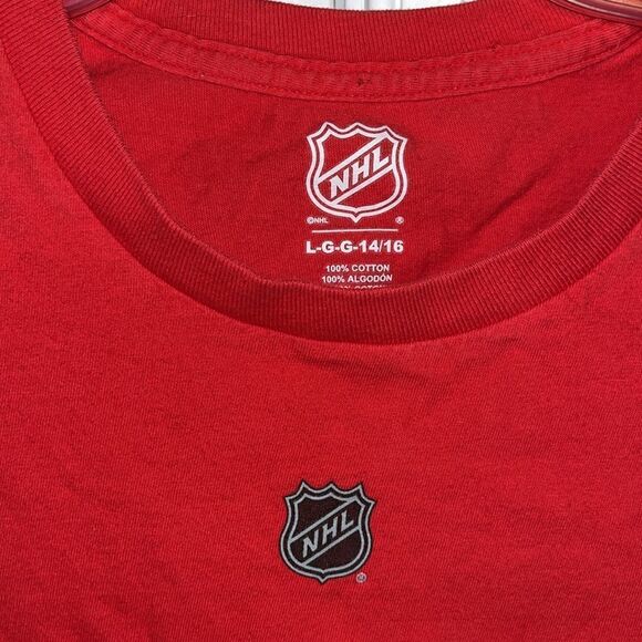 NHL Carolina Hurricanes #37 Andrei Svechnikov Red Eye Logo Jersey shirt L 14/16 - Picture 2 of 3